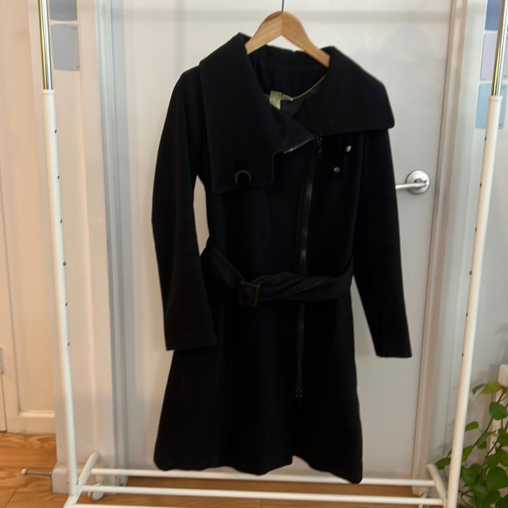 Black long winter coat. Very Stylish. Slightly used. Wool with nylon lining.